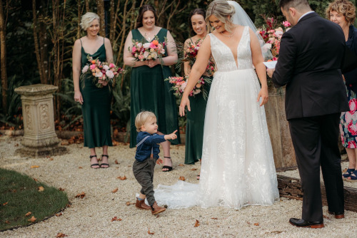 Bride, groom on path.